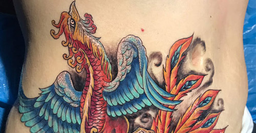 Phoenix tattoo done by Rene Pain INK